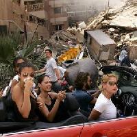 Spenser Platt - "Young libanese drive through devastated Beirut, 15 August 2006"